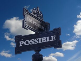 Picture of a road sign showing the road leads to the Possible