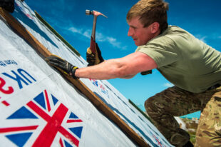 Picture of a military person hammering